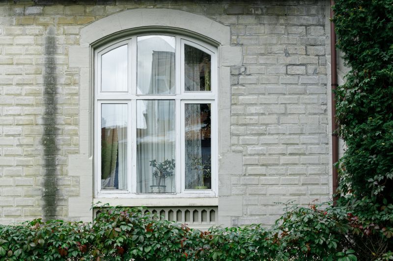 Elegant arched window installation